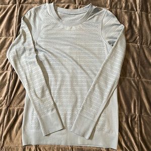Long sleeve Lululemon top. Pretty light blue color. Breathable material. Size 4.
